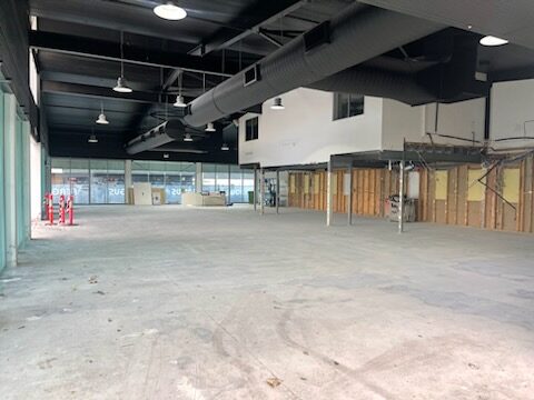 Interior demolition and ceiling dismantling underway during strip-out project by Razor Asbestos.